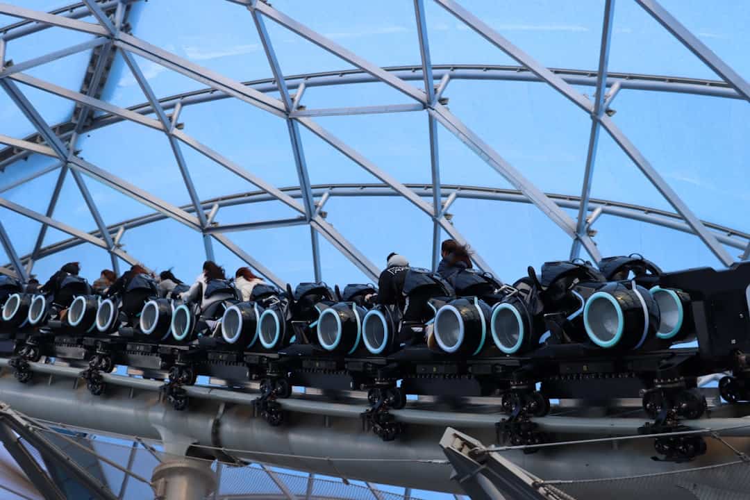 tracking roller coasters music events sporting events - a group of people riding roller coasters on a roller coaster