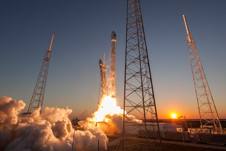 roller coaster launch systems - Low angle of modern rocket taking off into cloudless sky during beautiful sunset over space factory