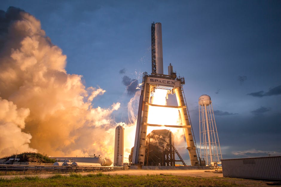 roller coaster launch systems - A dramatic shot of a SpaceX rocket launch against a colorful dusk sky, depicting power and technology.