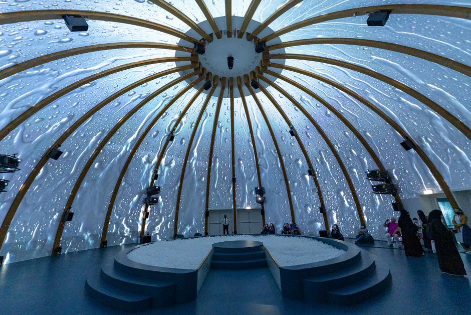 sports venues - Stunning dome interior with projected water visuals at Dubai Expo Pavilion.