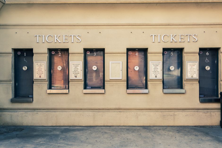 live music - Row of closed ticket booths in Baltimore city center, showcasing urban architecture.