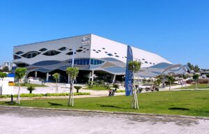 Exterior of the Antalya Aquarium building with its wave-patterned facade