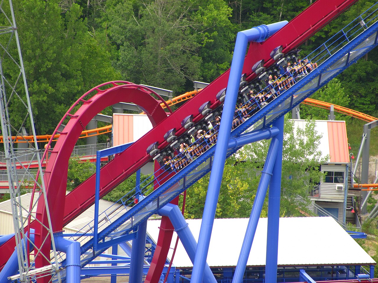 Banshee train climbing the 167-foot lift hill