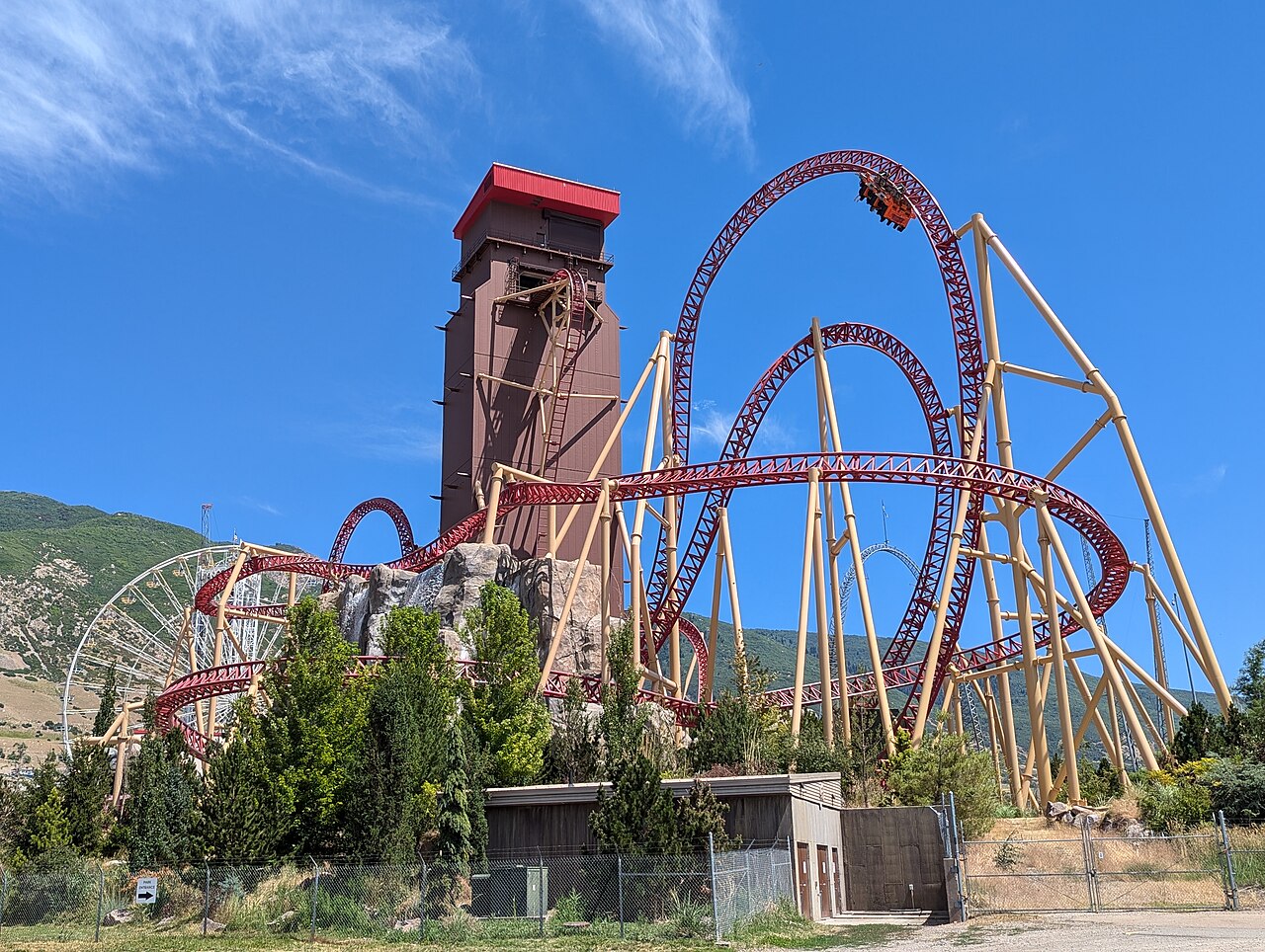 Cannibal's 208-foot lift tower and red track seen from outside Lagoon