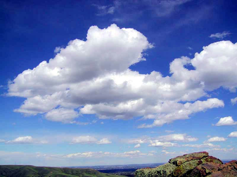 Fair-weather cumulus clouds in a blue sky