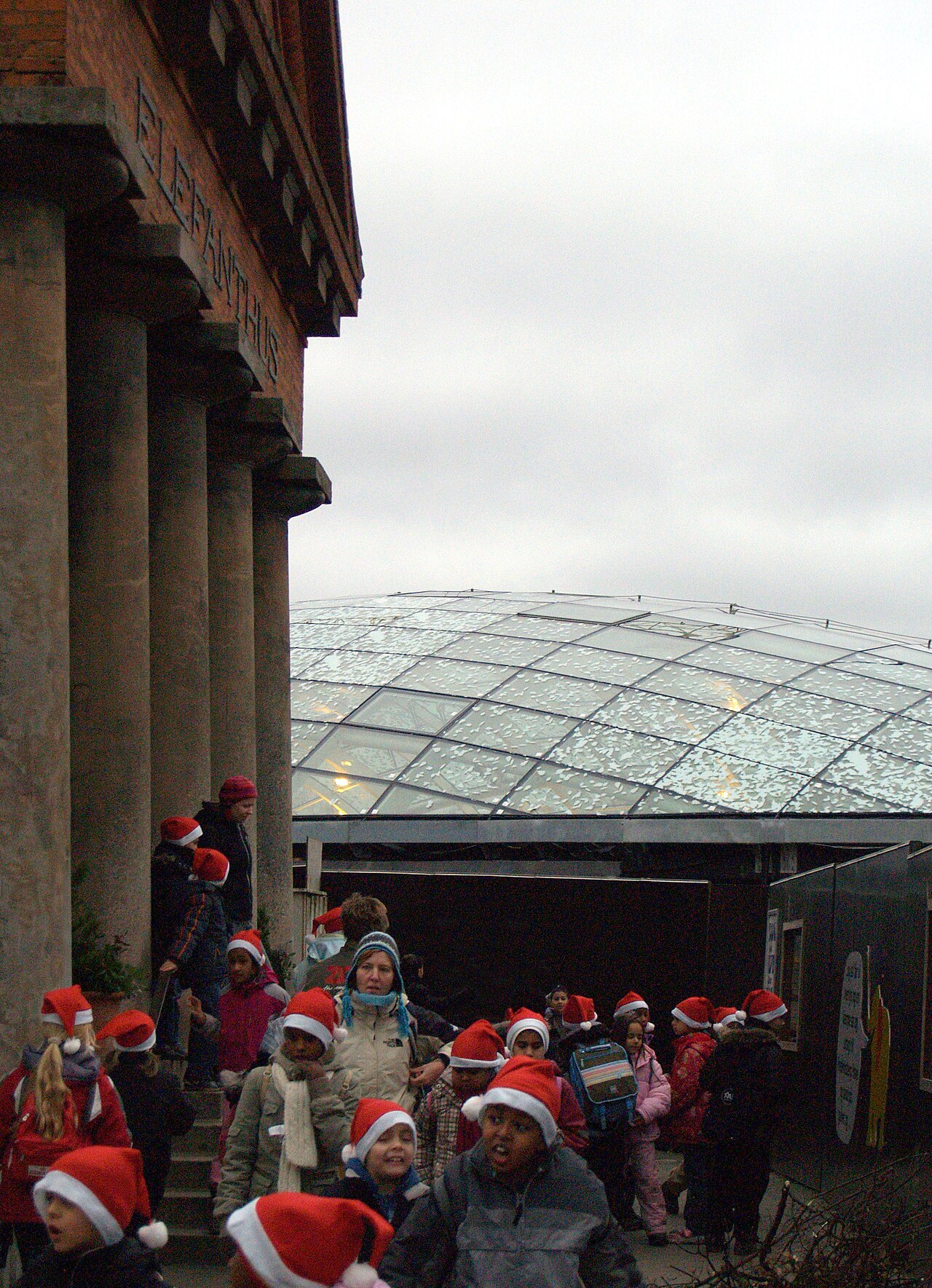 Old Elephant House at Copenhagen Zoo with the glass domes of Norman Foster's building behind
