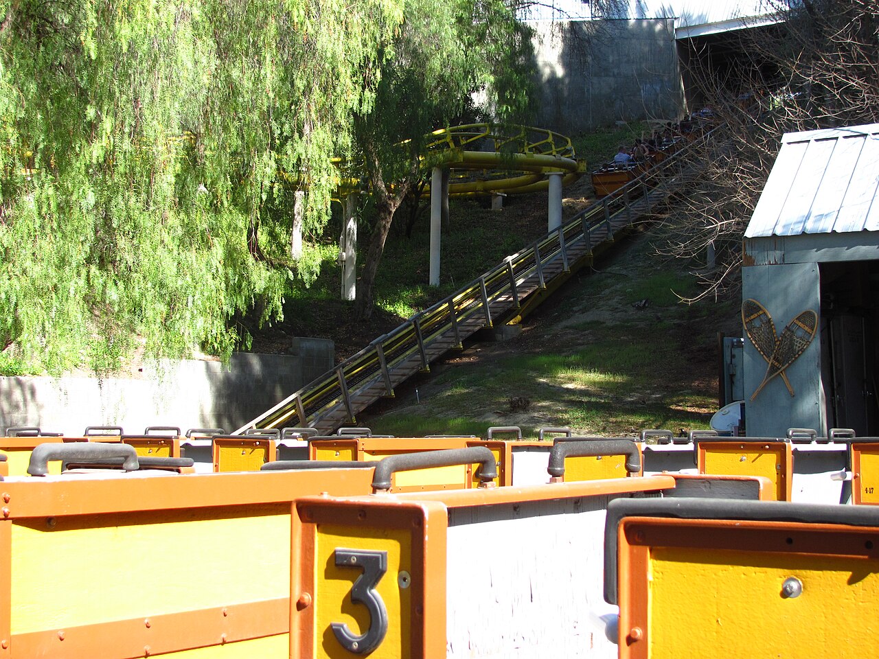 Gold Rusher lift hill and yellow helix at Six Flags Magic Mountain