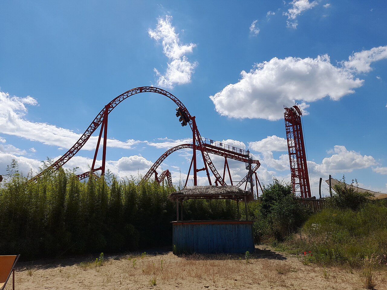 A Huracan train riding through one of the coaster's five inversions at Belantis