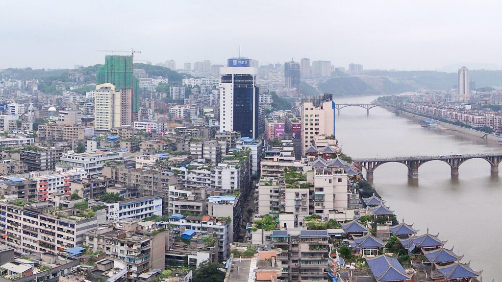 Skyline of Luzhou on the Yangtze River in Sichuan, China, the city where Merry Pi Beach Park and its Hurricane slide are located