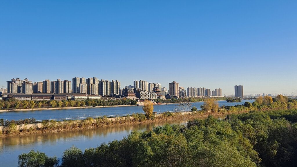 The Xianyang skyline across the Wei River in Shaanxi, China, the city where 88 degrees C Spring Water World and its Hurricane Tower slide are located