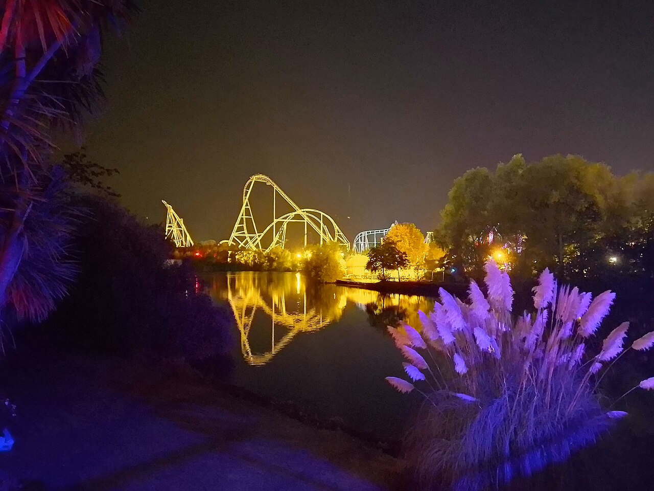 Hyperia roller coaster illuminated at night at Thorpe Park