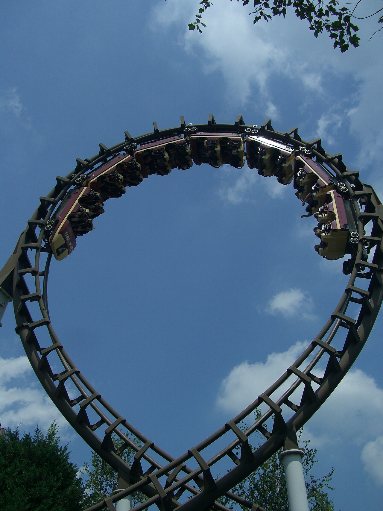 Train passing through the vertical loop of the Hersheypark Boomerang coaster, photographed from directly below in its Sidewinder days