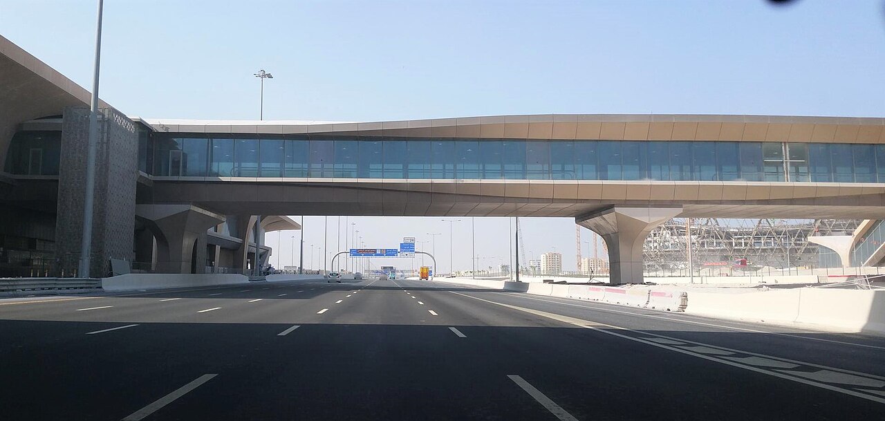 Lusail Stadium under construction in October 2020, with the Lusail metro station in the foreground