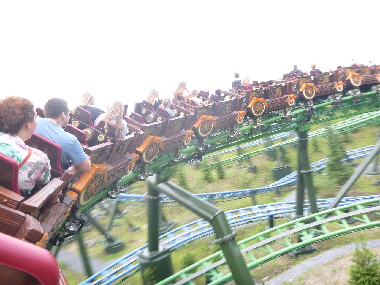 On-ride view of Max & Moritz's wooden cart trains with both tracks visible at Efteling