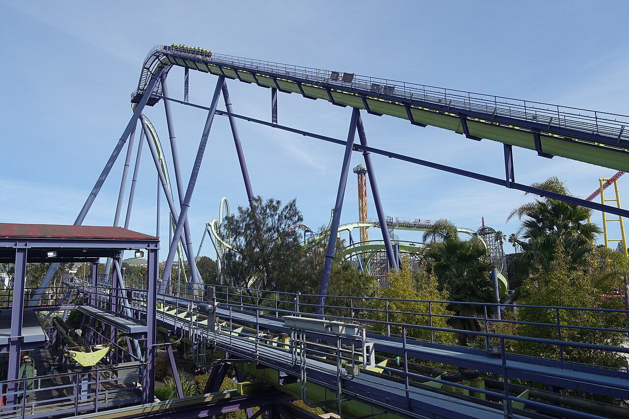 A Medusa train climbs the 150-foot lift hill above the station at Six Flags Discovery Kingdom