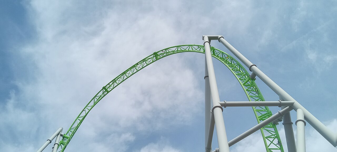 Looking up at The Monster's dive loop against the sky at Adventureland in Altoona, Iowa