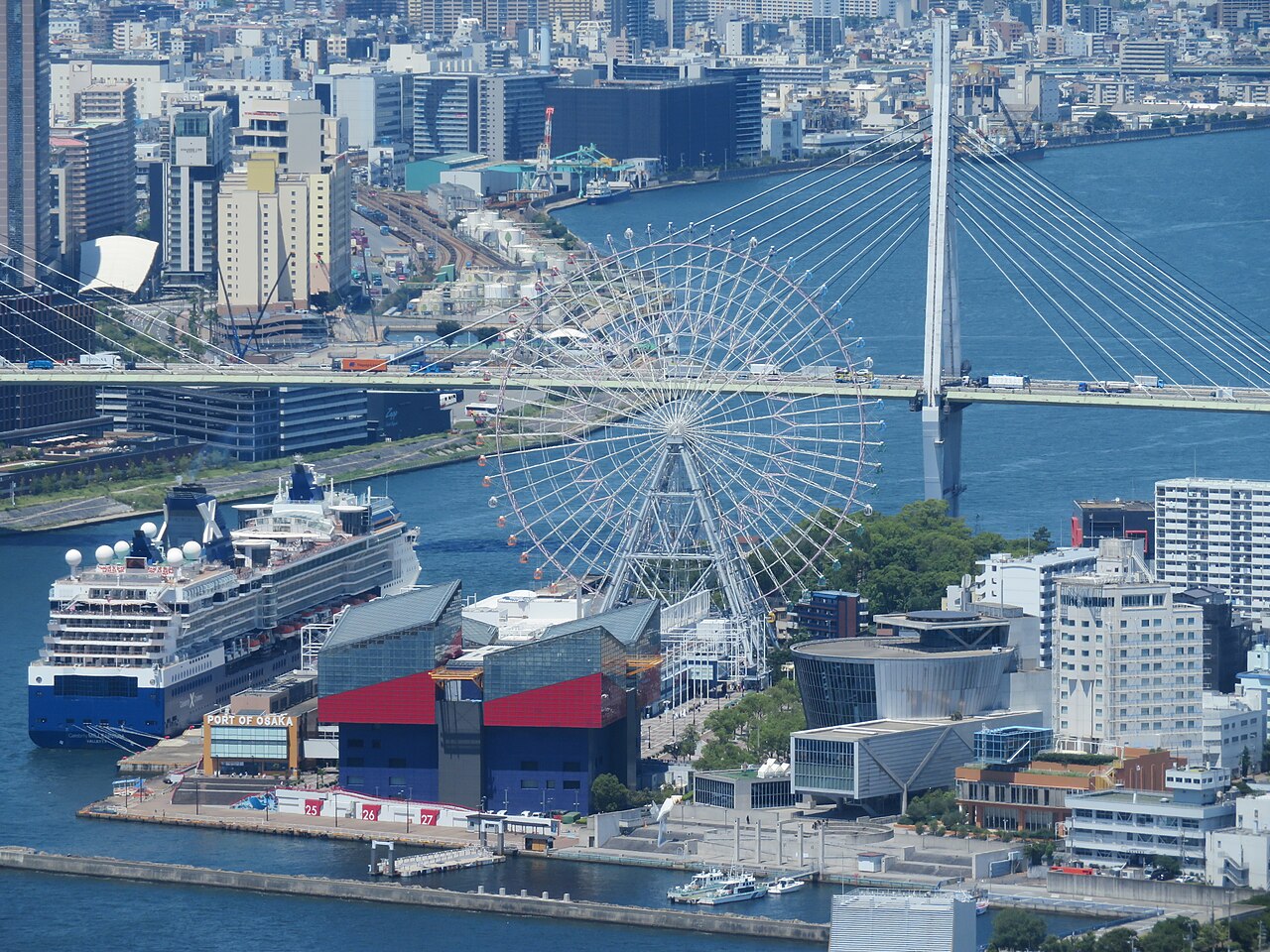 Aerial view of Osaka Aquarium Kaiyukan beside the Tempozan Ferris Wheel on Osaka Bay