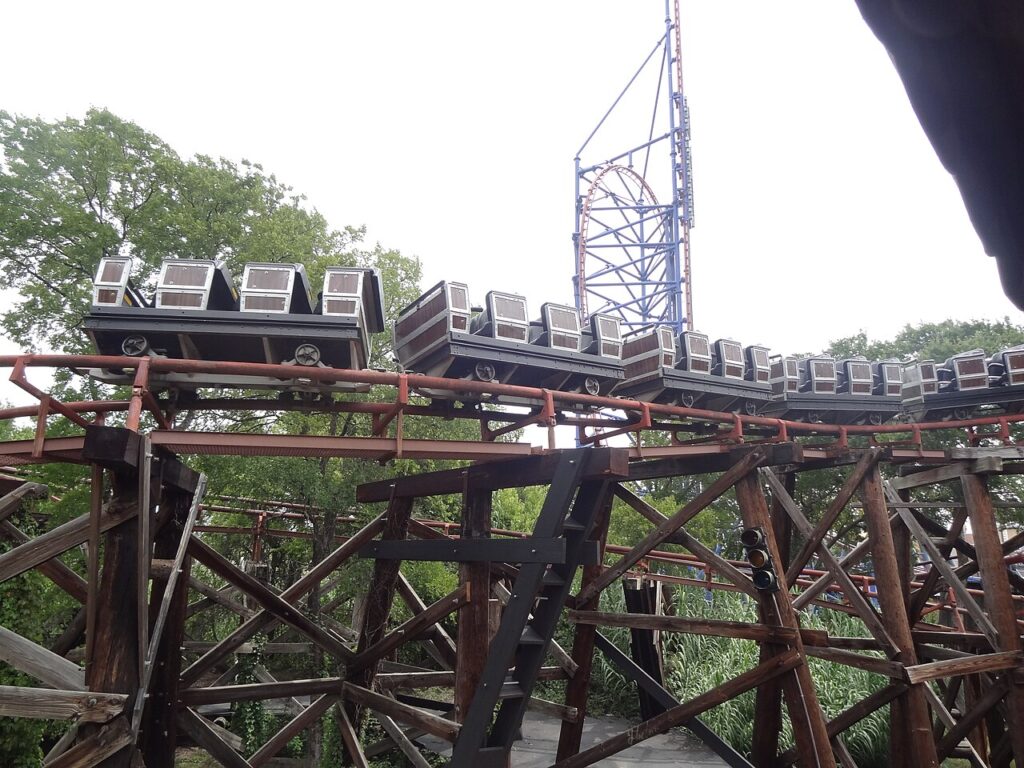 Runaway Mine Train roller coaster train on the track at Six Flags Over Texas