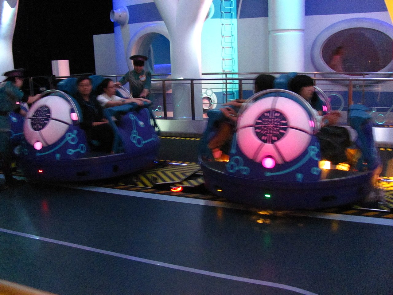 Spherical spinning ride vehicles of Space Fantasy - The Ride in the station at Universal Studios Japan