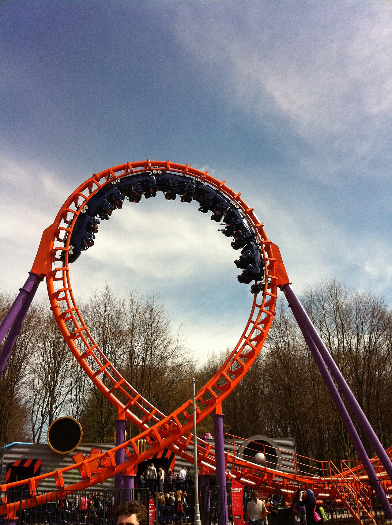 Close-up of a Speed of Sound train upside down in the vertical loop at Walibi Holland