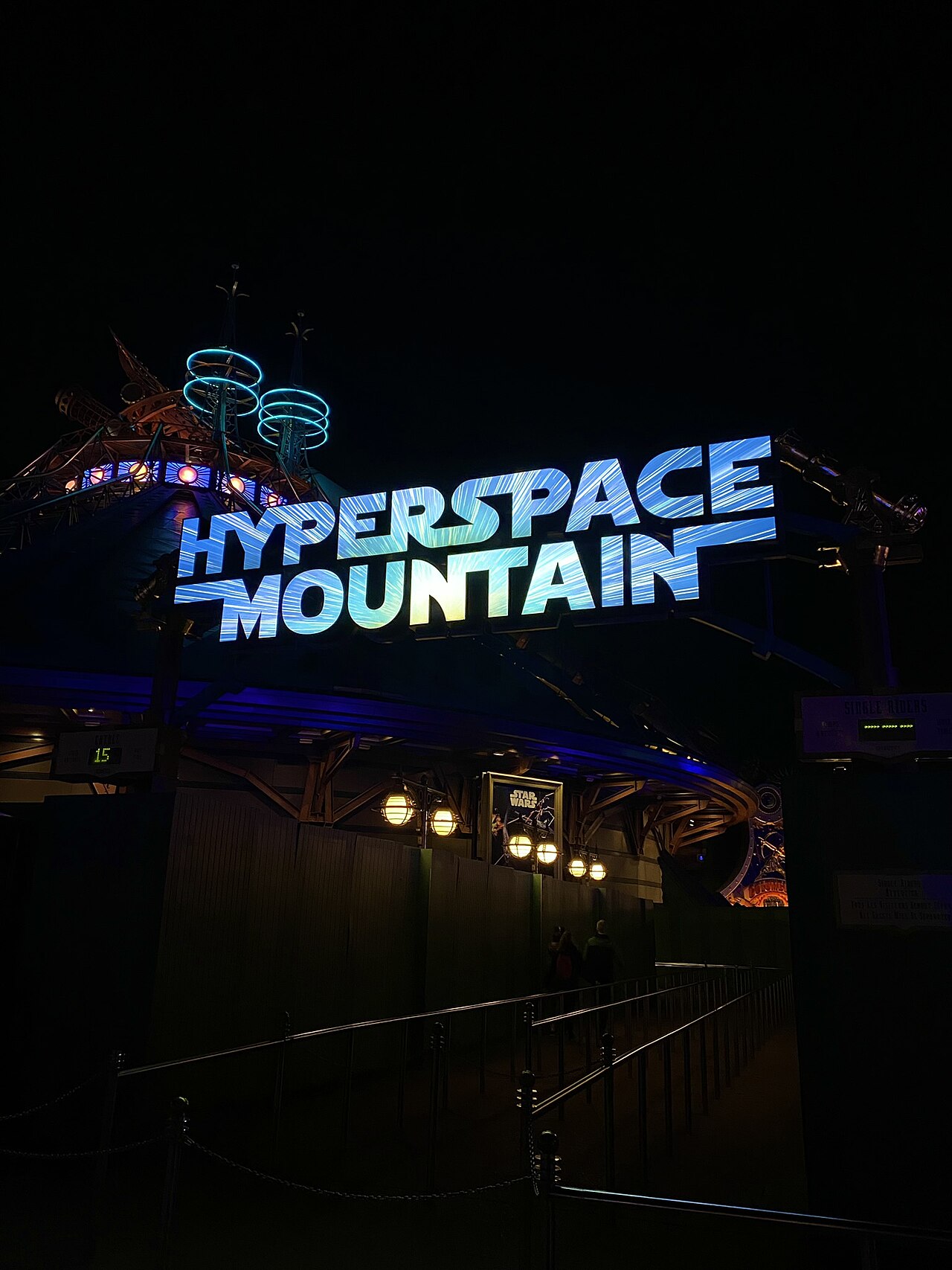 Star Wars Hyperspace Mountain entrance sign at night