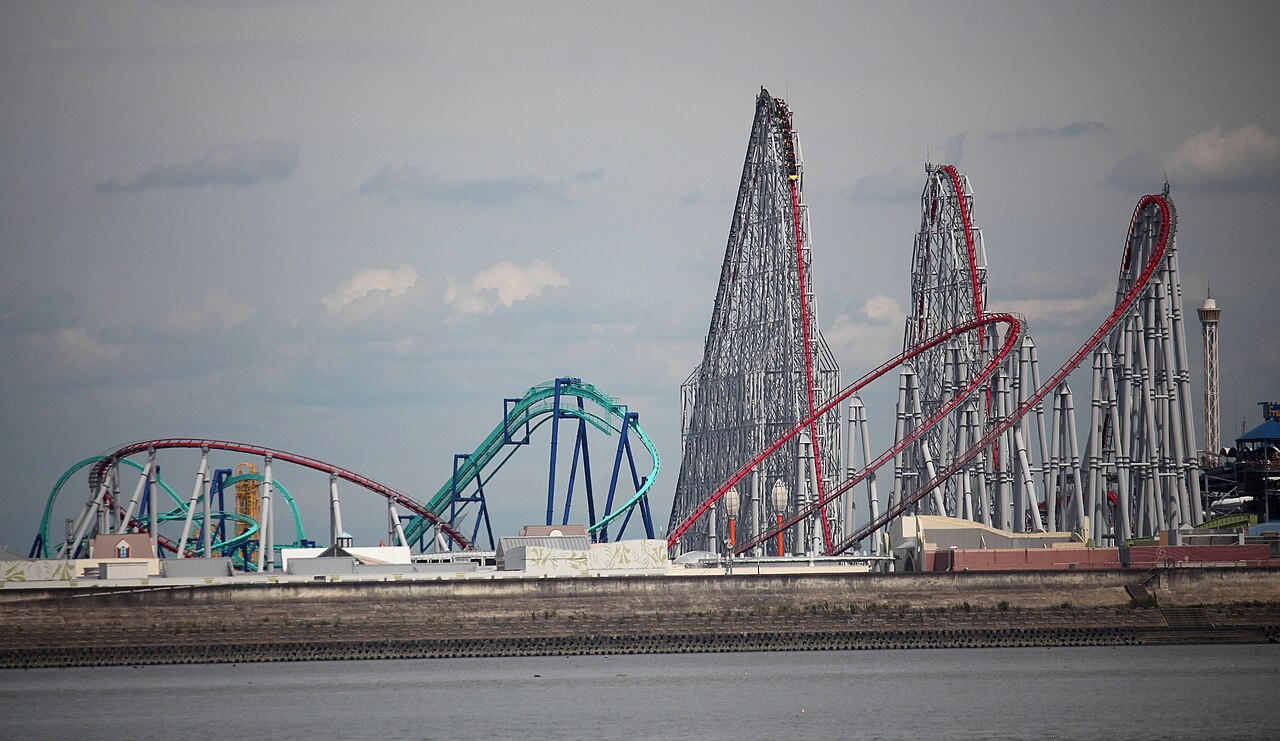 Full layout of Steel Dragon 2000 seen across the water at Nagashima Spa Land
