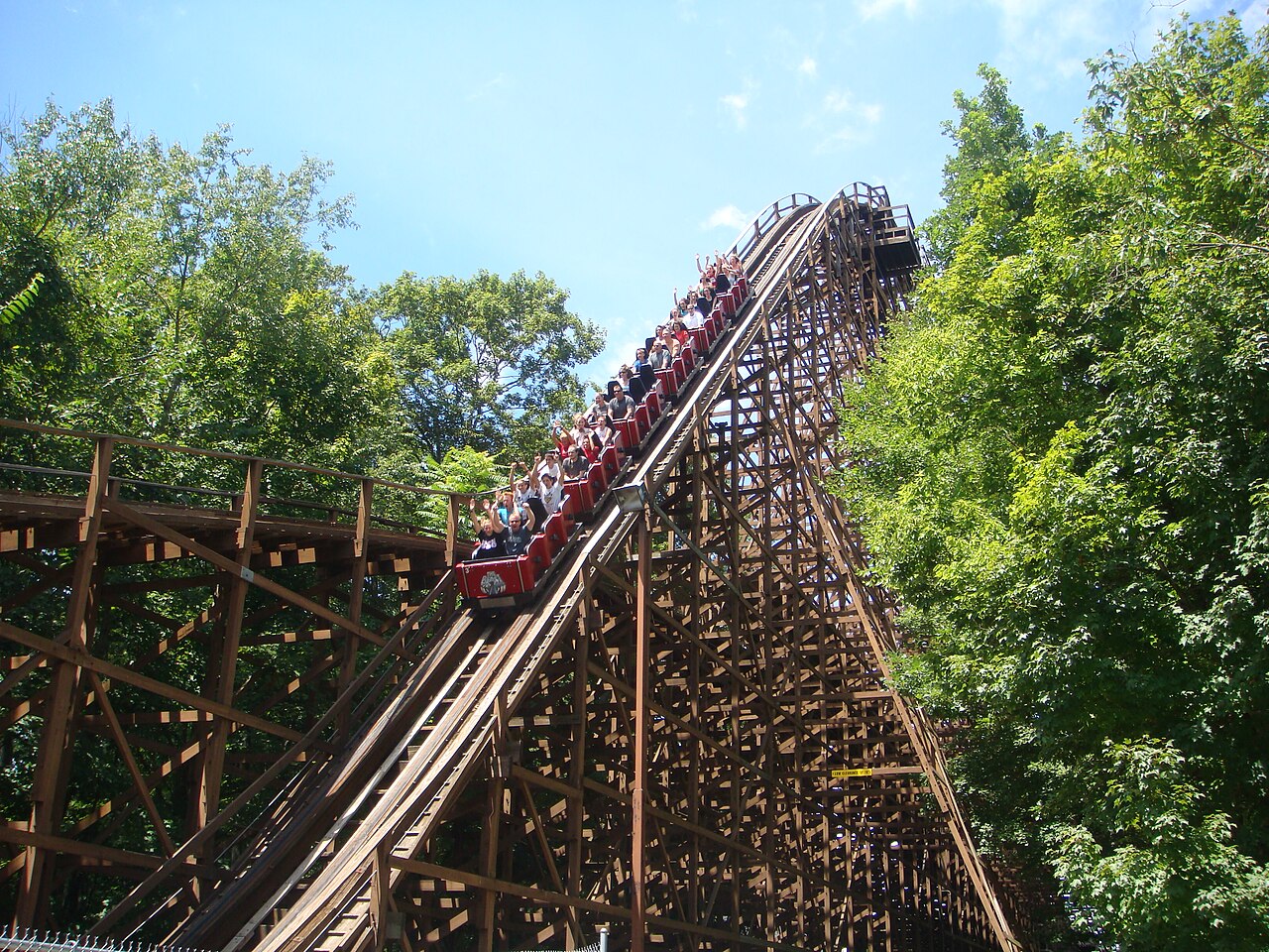 The Beast's first drop plunging into the trees at Kings Island