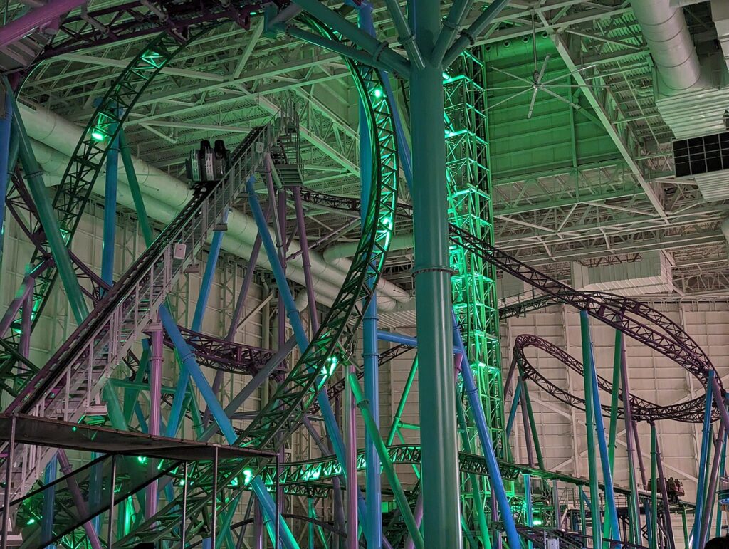 TMNT Shellraiser roller coaster train on the vertical lift inside Nickelodeon Universe at American Dream