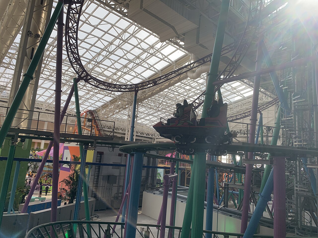 TMNT Shellraiser car on green track high inside Nickelodeon Universe