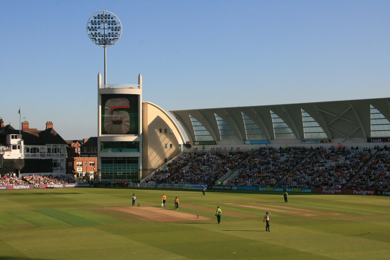 The scoreboard and Radcliffe Road Stand at Trent Bridge in evening light