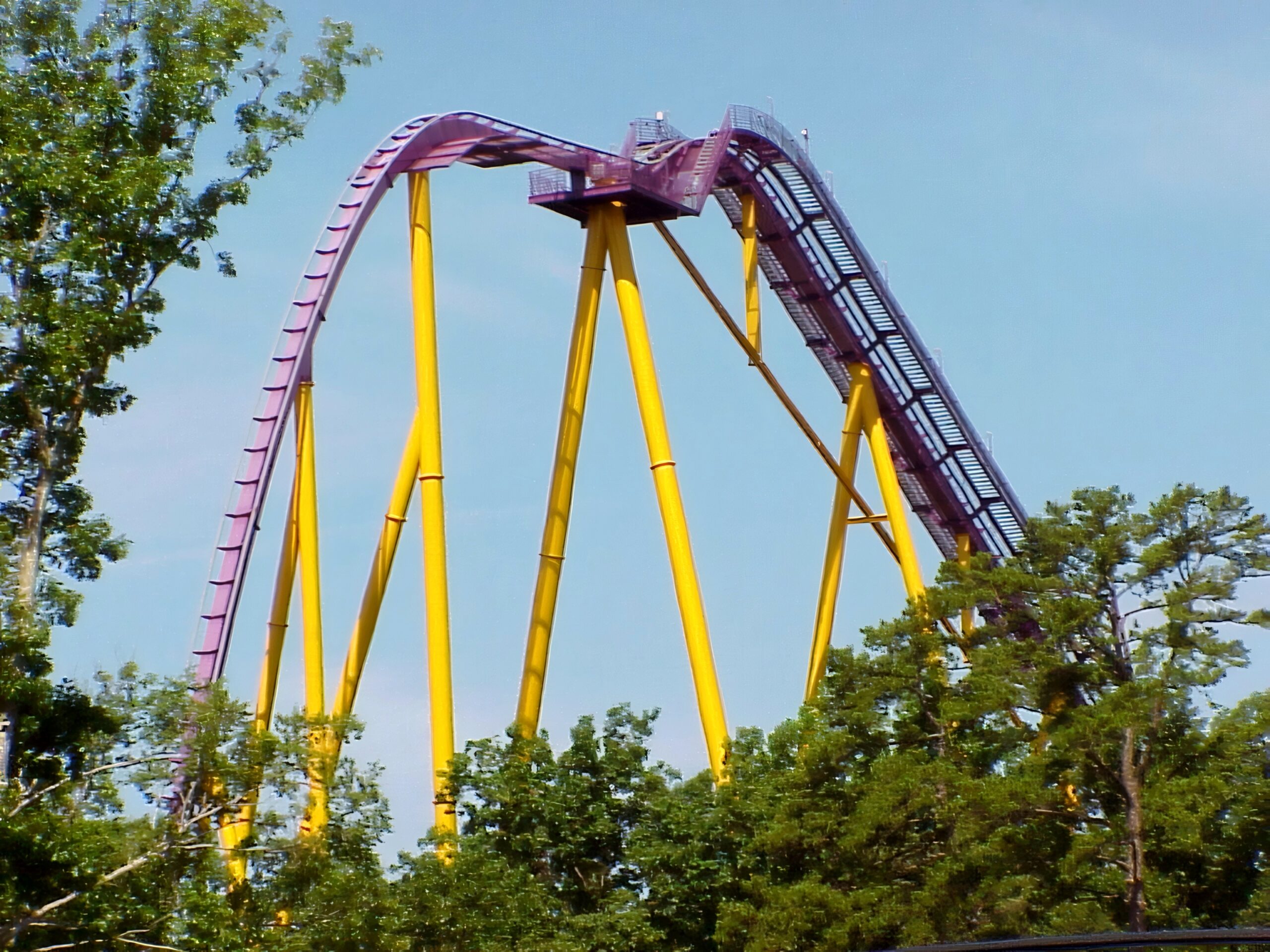 An Apollo's Chariot hill and its yellow supports seen from the parking lot, July 2001