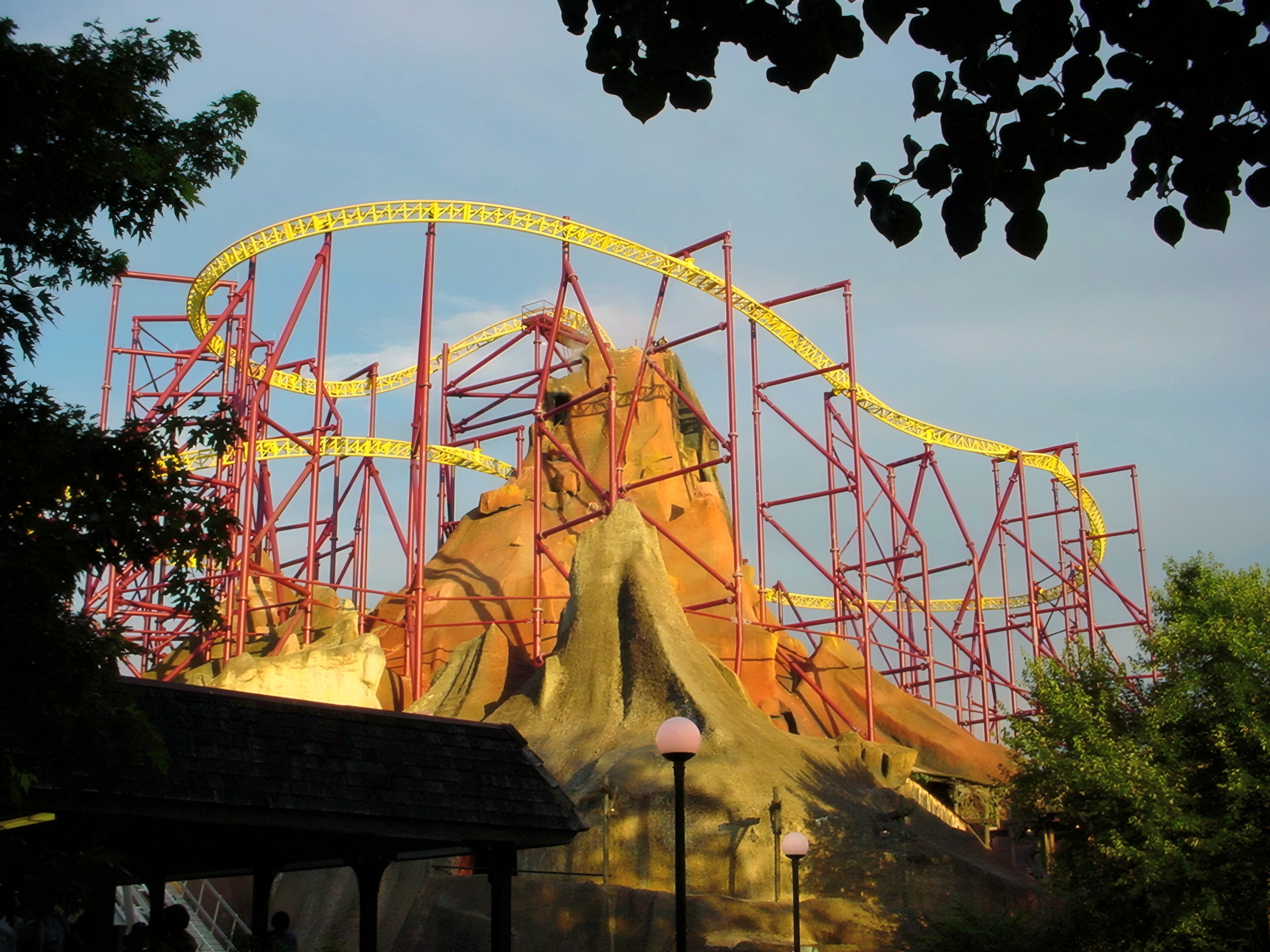 Volcano: The Blast Coaster's yellow track over the volcano rockwork at Paramount's Kings Dominion, July 2001