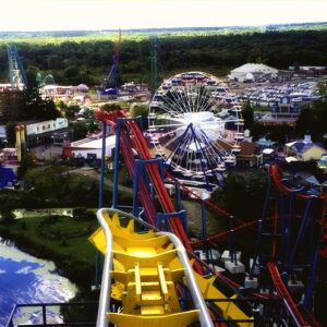 The first drop of Batman Knight Flight from the front row, looking out over the lake, the Ferris wheel and the park at Geauga Lake