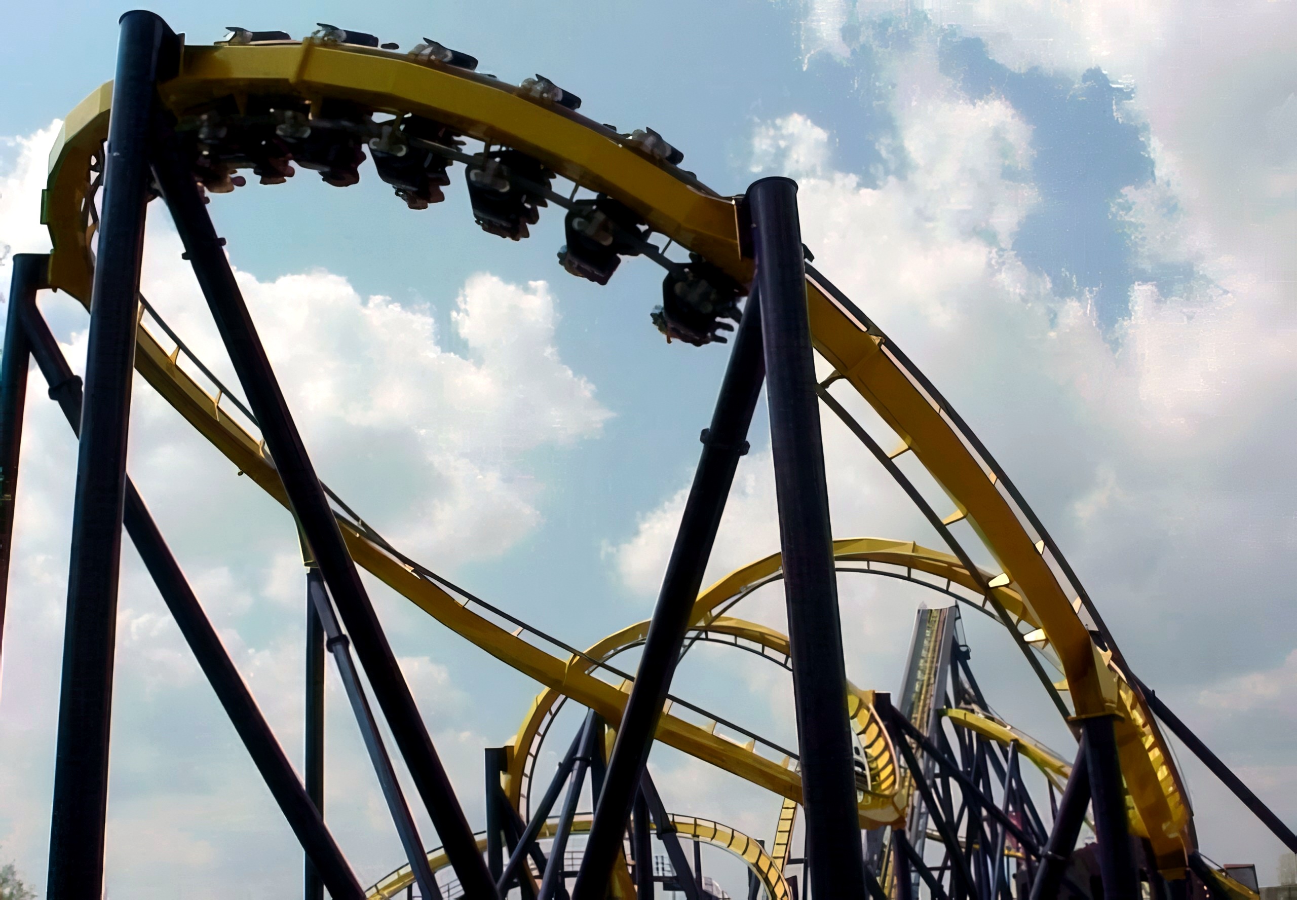 A Batman Knight Flight train navigating the interlocking corkscrews at Geauga Lake, May 2000