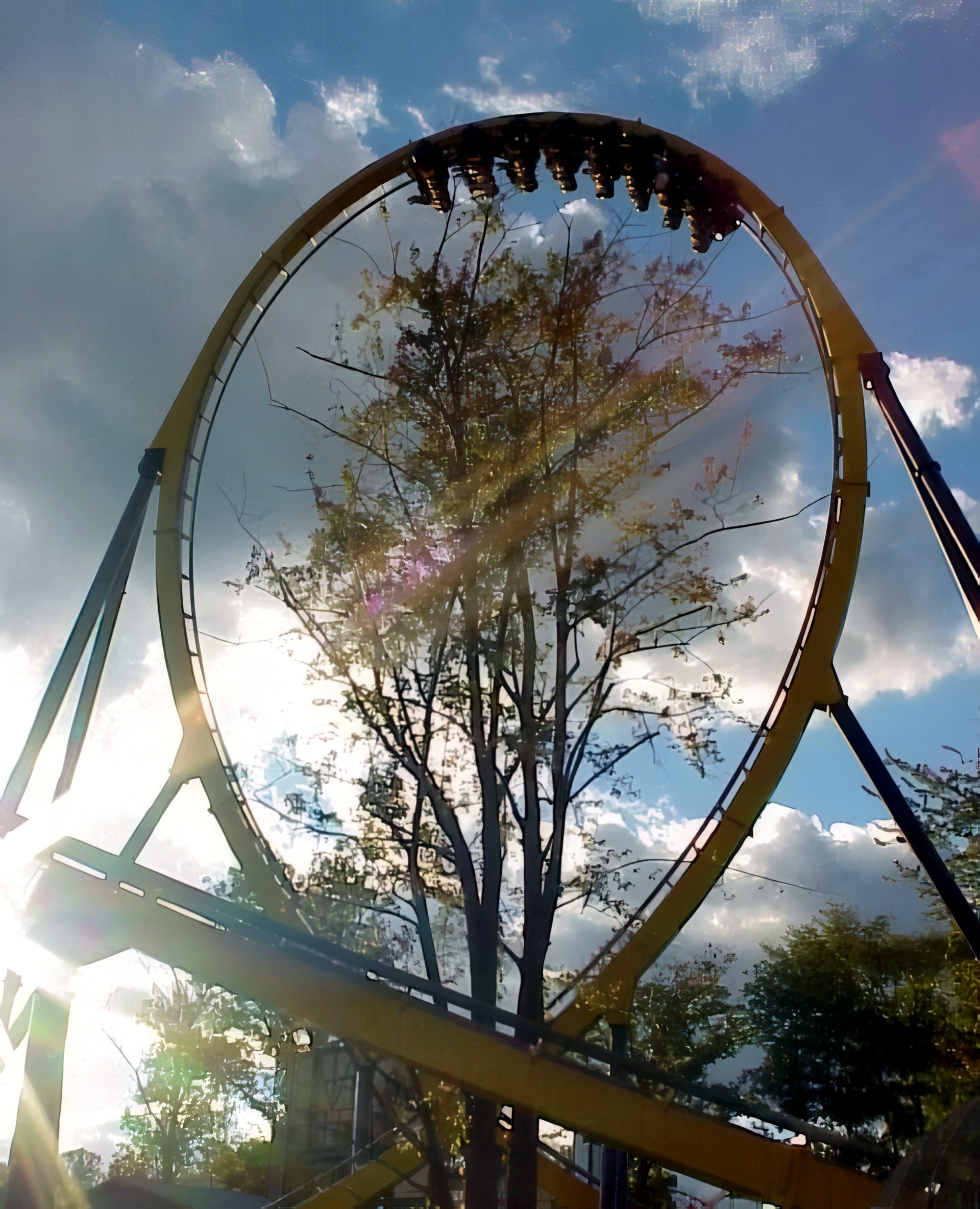 Batman Knight Flight's vertical loop against the sun at Geauga Lake, May 2000