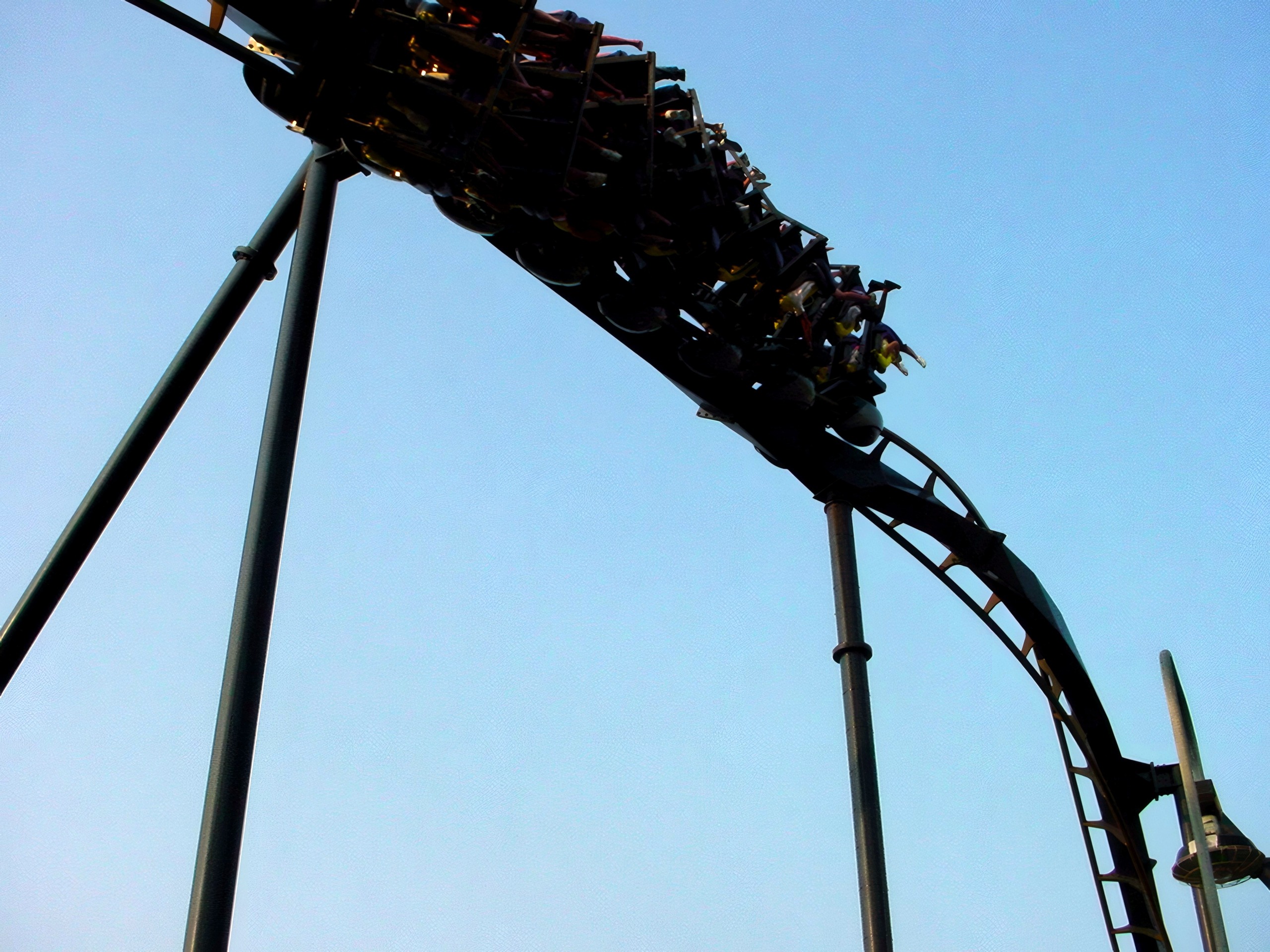 A Batman: The Ride train banking against the sky at Six Flags St. Louis, June 2002