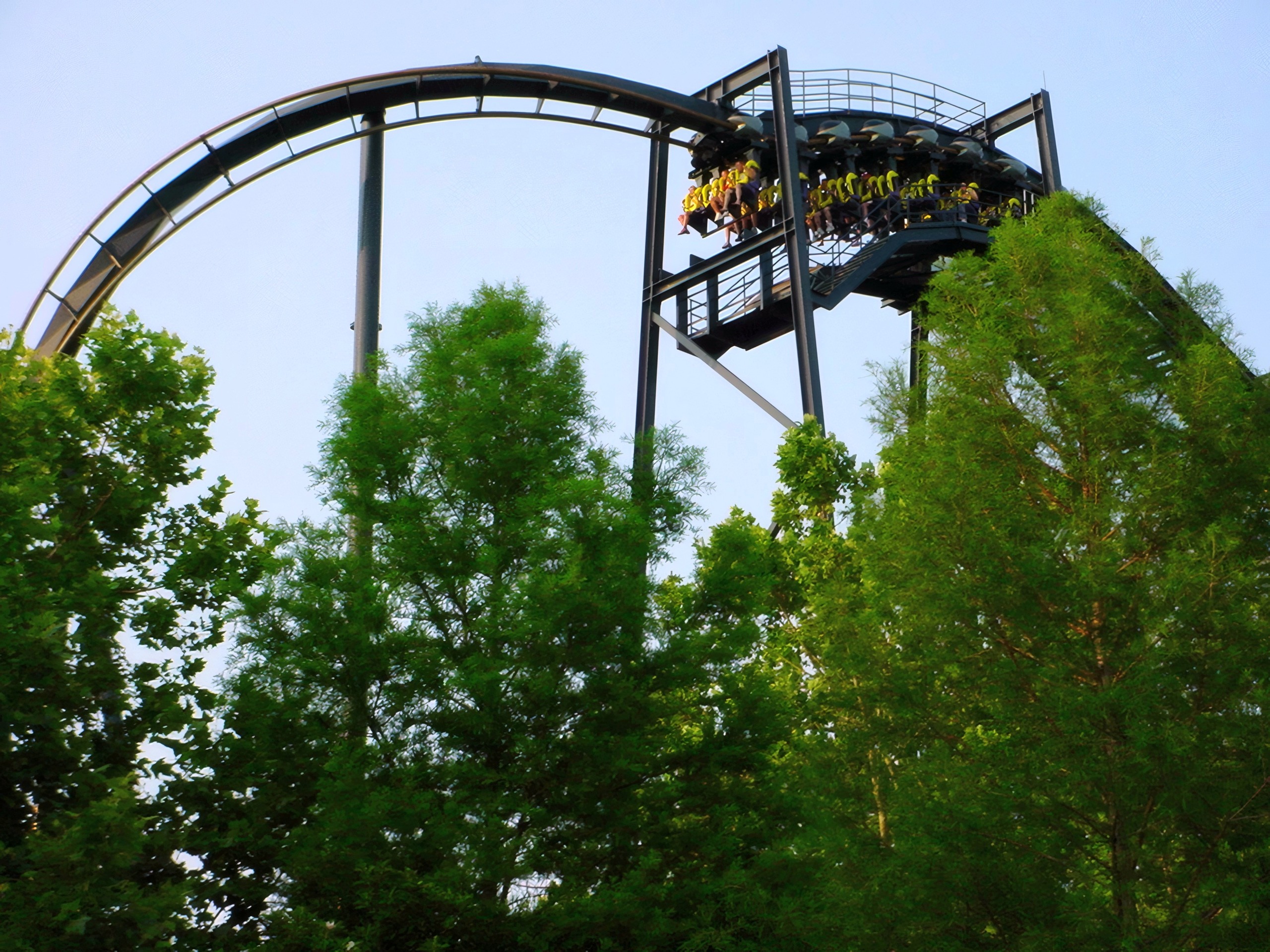 Riders dangling through Batman: The Ride's vertical loop at Six Flags St. Louis, June 2002