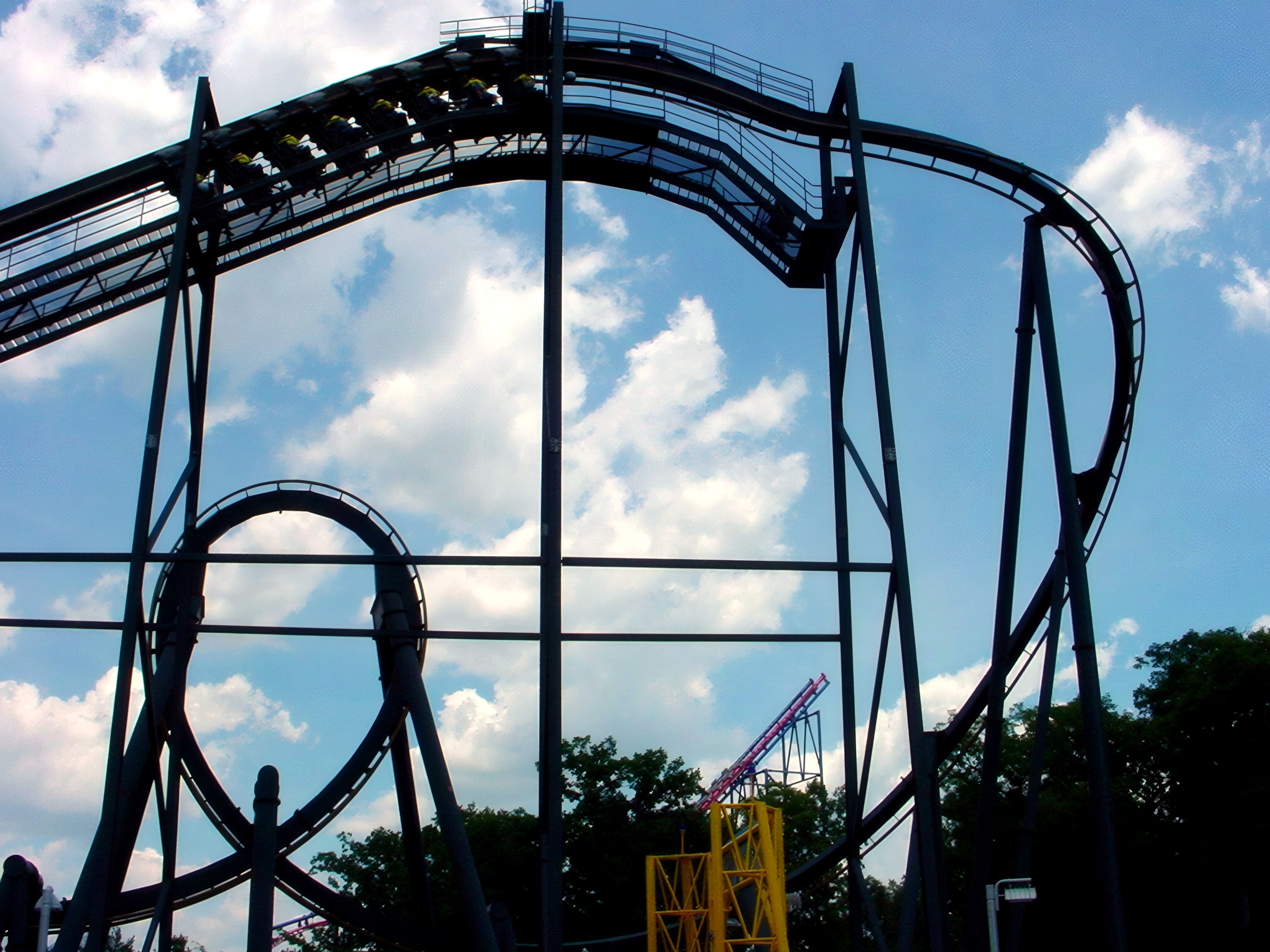 The vertical loop under a cloudy sky, Batman: The Ride, July 2001