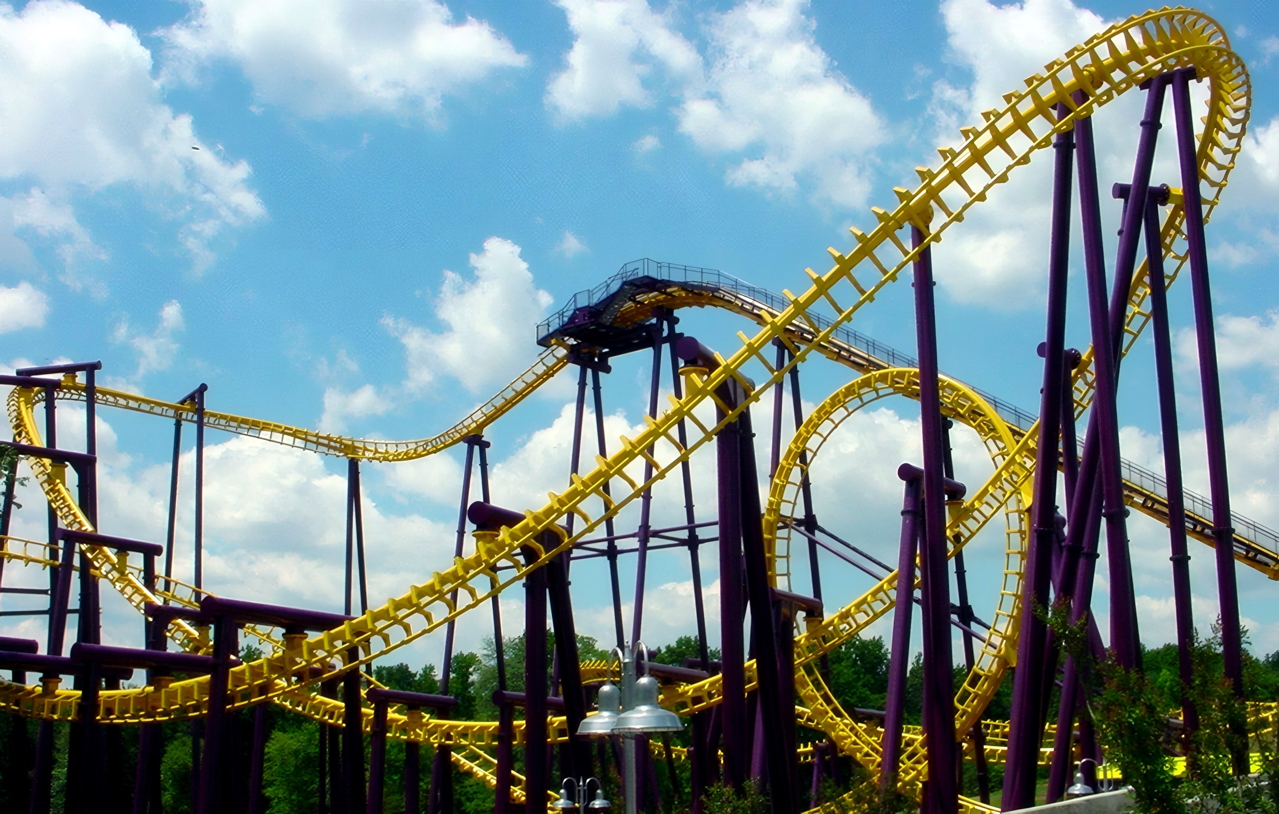 The Batwing lift hill and yellow track layout against the clouds at Six Flags America, July 2001