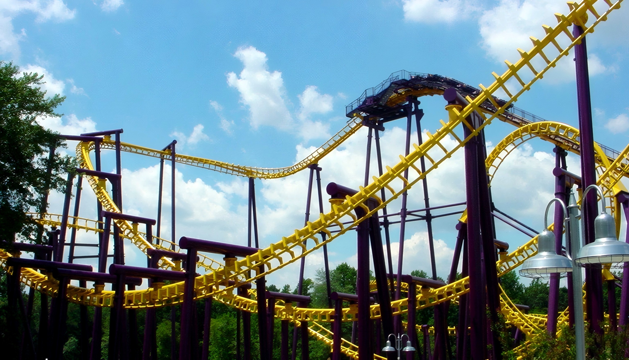 Batwing's yellow track and lift hill seen from the plaza at Six Flags America, July 2001