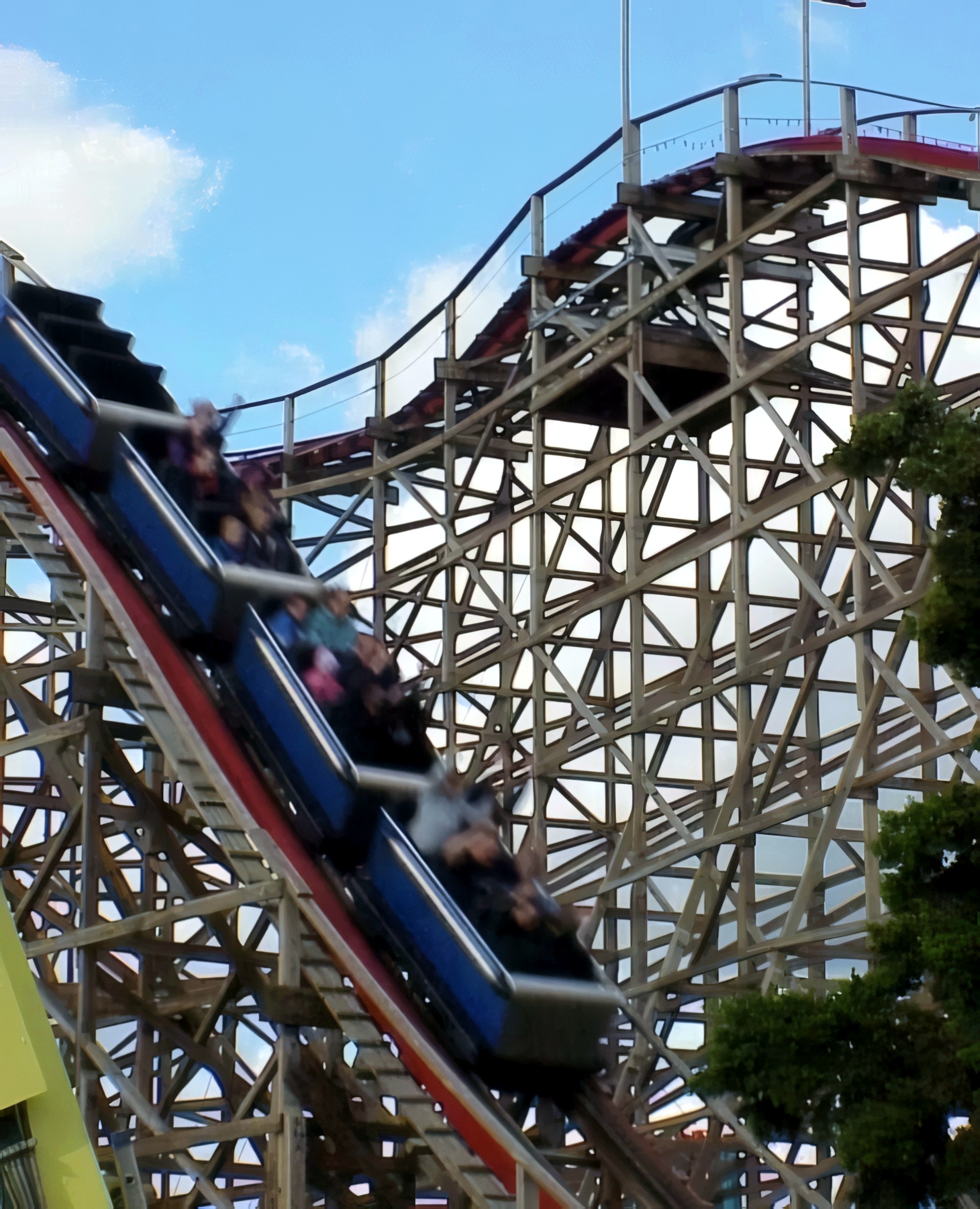 A blue Big Dipper train coming down the drop at Geauga Lake, May 2000