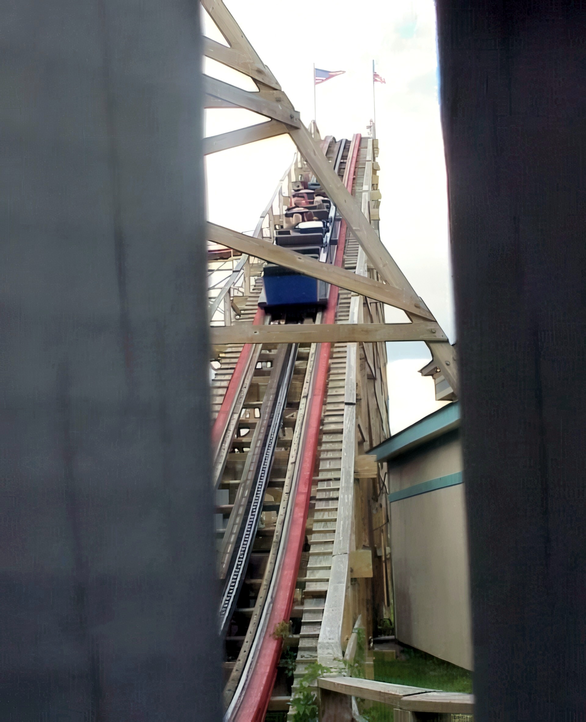Big Dipper's lift hill framed by support beams at Geauga Lake, May 2000