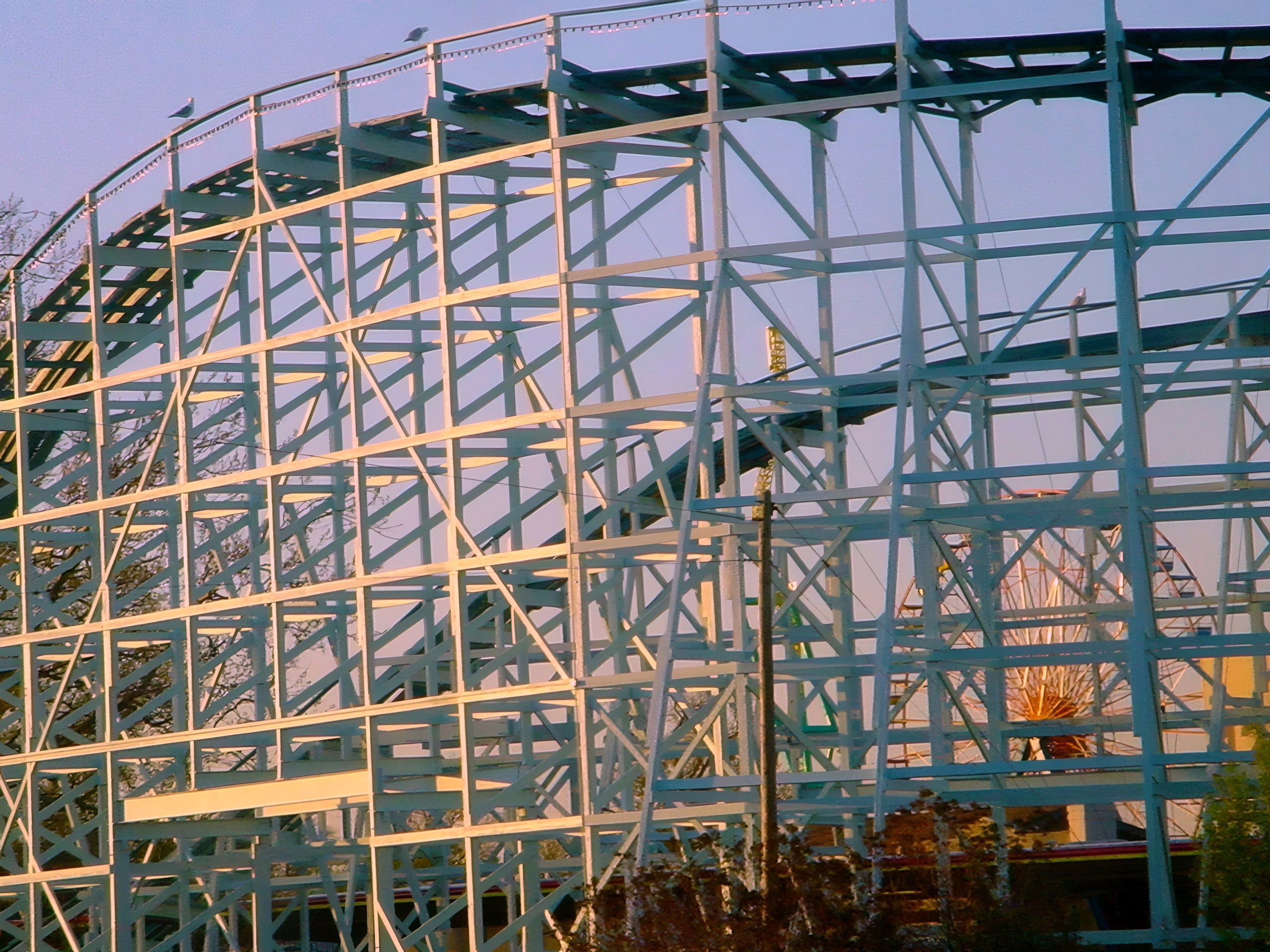 Wooden coaster lift hill and turnaround structure, Ferris wheel behind, Blue Streak, May 2002