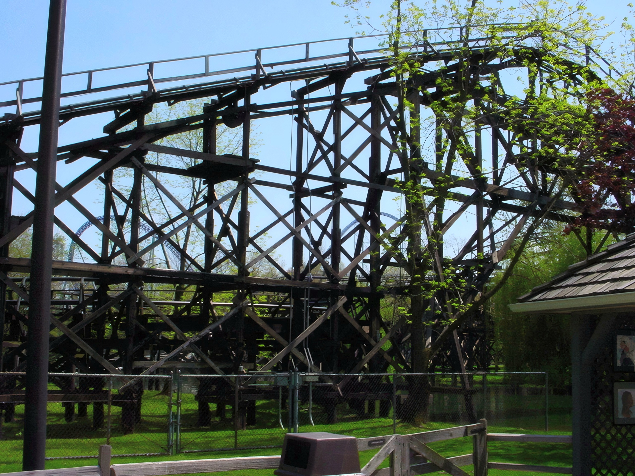 The dark wooden trestle structure of Cedar Creek Mine Ride at Cedar Point, May 2002