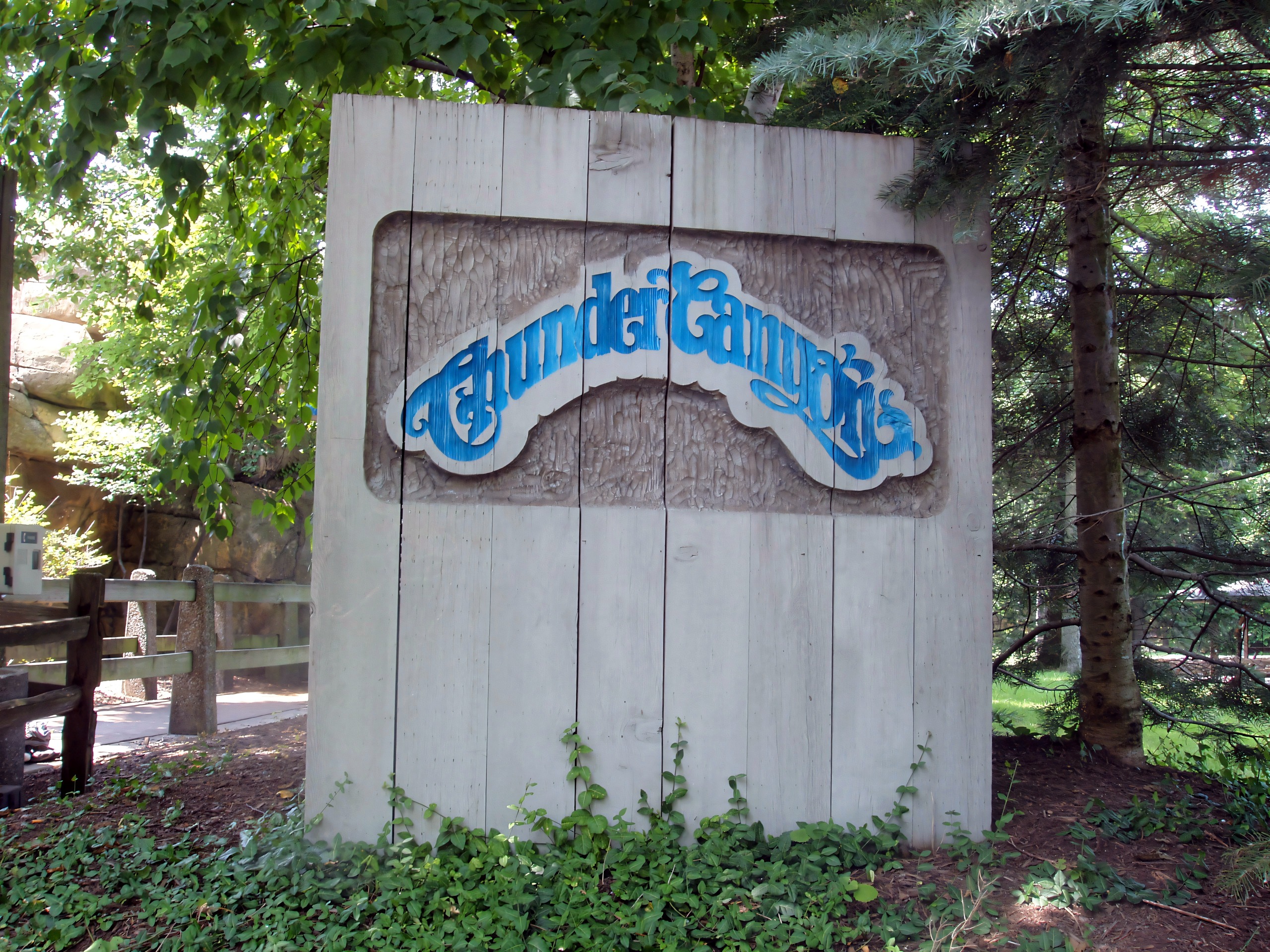 The Thunder Canyon entrance sign on weathered wood at Cedar Point, July 2005