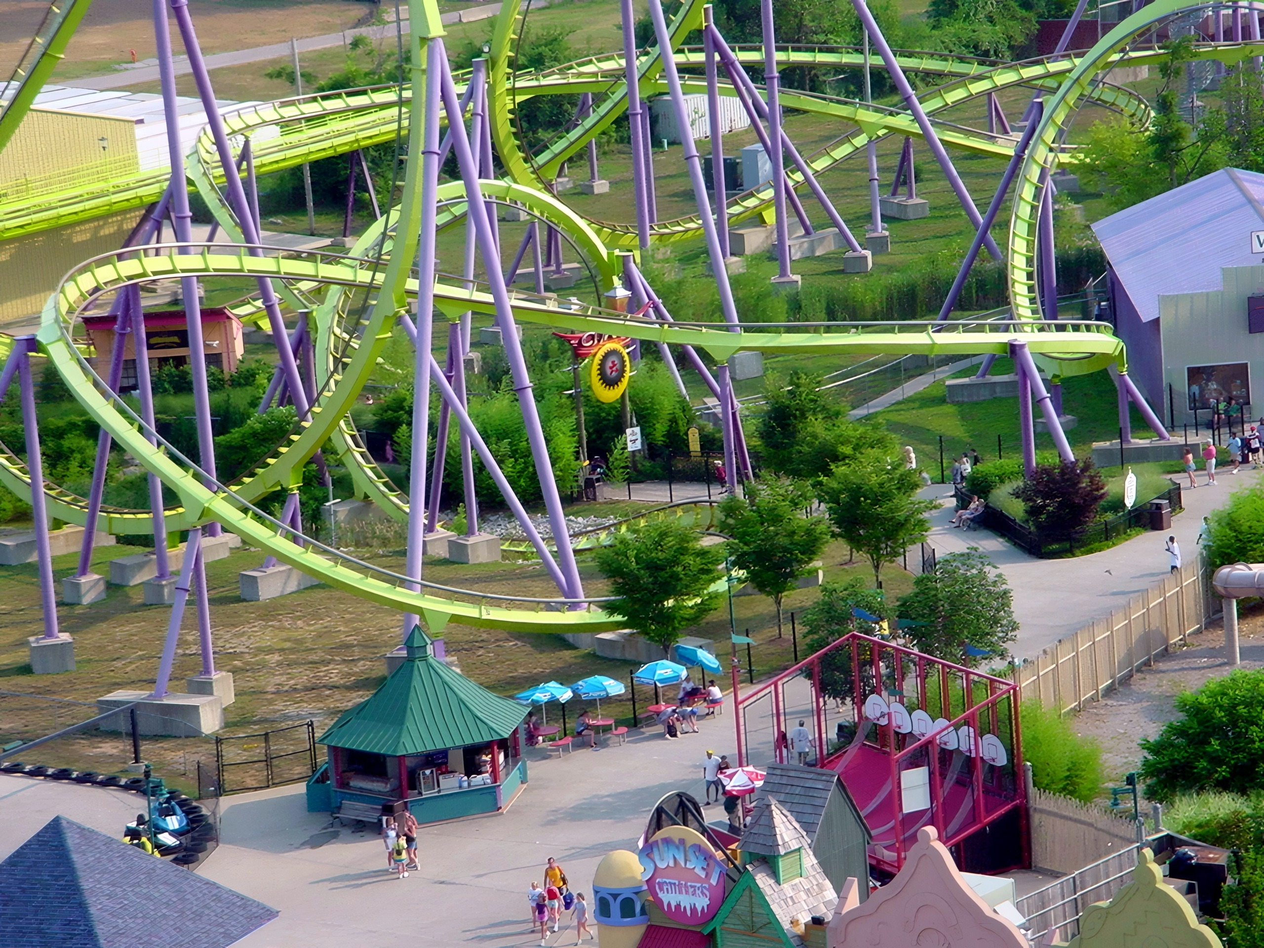 Close aerial shot of yellow steel coaster loop and corkscrew, Chang, July 2002