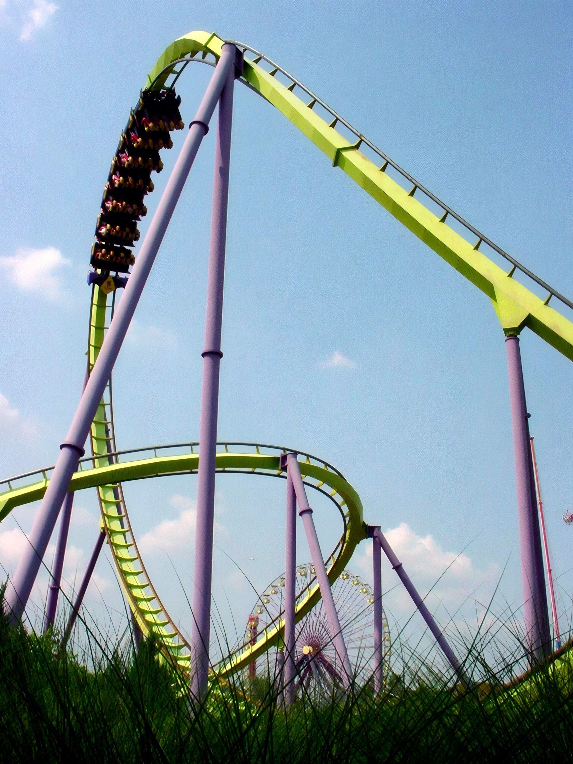 Coaster train inverted going through loop element, Chang, July 2002