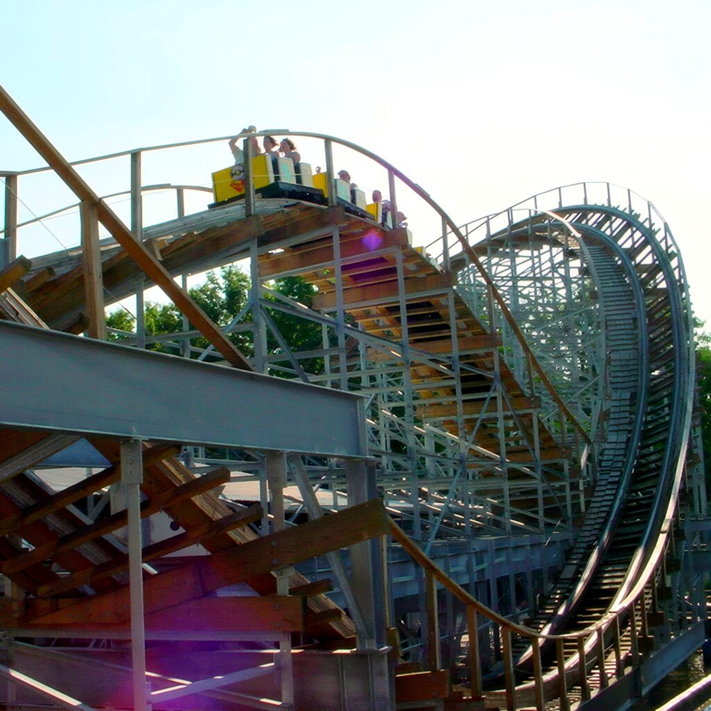 Cornball Express at Indiana Beach: a train cresting a hill on the wooden structure