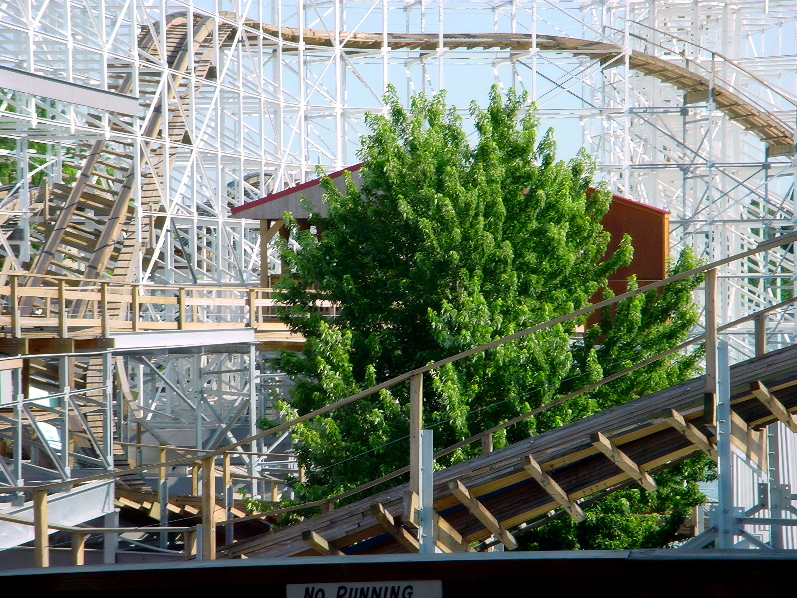 Cornball Express's wooden structure behind the trees at Indiana Beach, June 2002