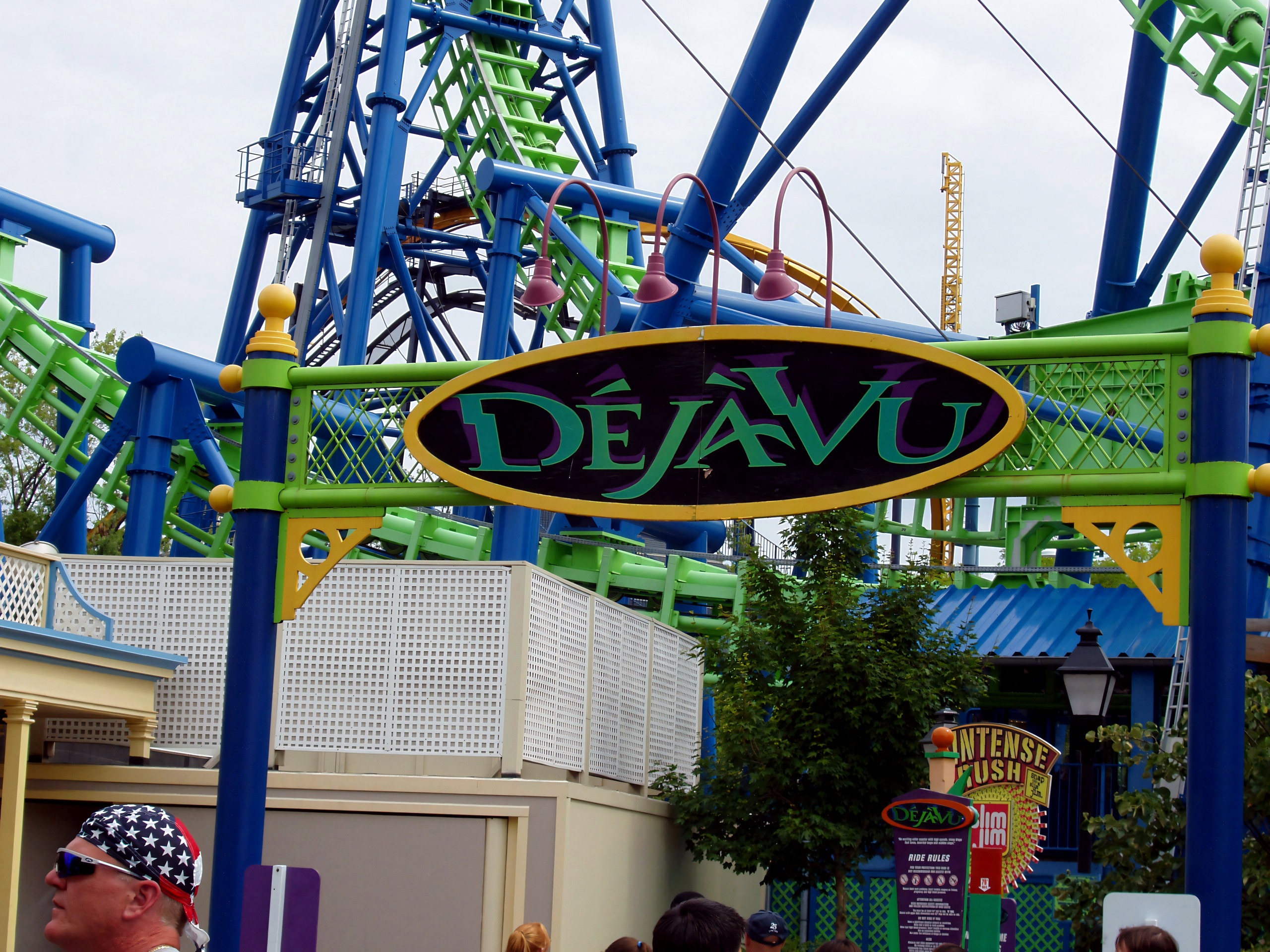 The Déjà Vu entrance sign with the track overhead at Six Flags Great America, August 2005